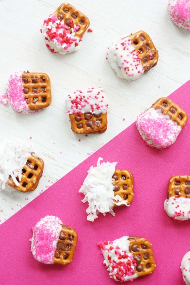 Mini pretzel squares dipped in chocolate and rolled in sprinkles.