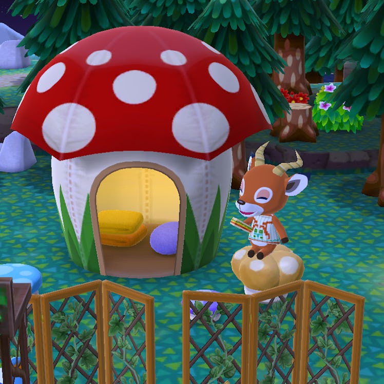 Beau from 'Animal Crossing' sits near a mushroom-shaped tent and eats a sandwich in the video game.