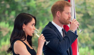 Meghan Markle drinking champagne with Harry