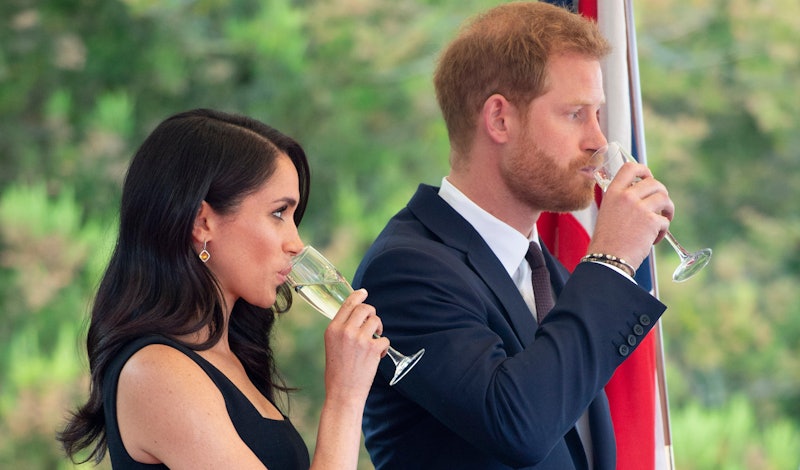 Meghan Markle drinking champagne with Harry