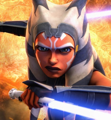 Ahsoka with an angry facial expression holding two weapons and fire-effect in the background