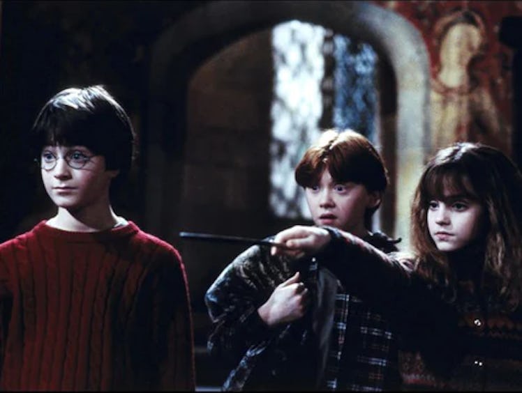 Harry, Ron, and Hermoine in Harry Potter and the Sorcerers Stone