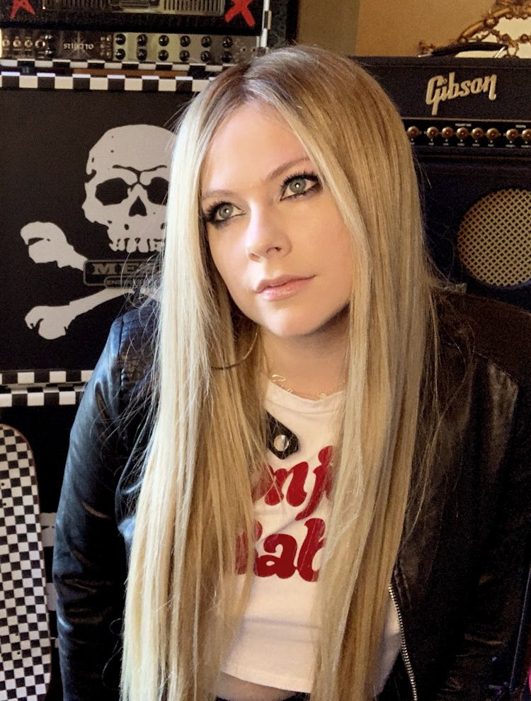 Avril Lavigne in the studio posing for a picture.