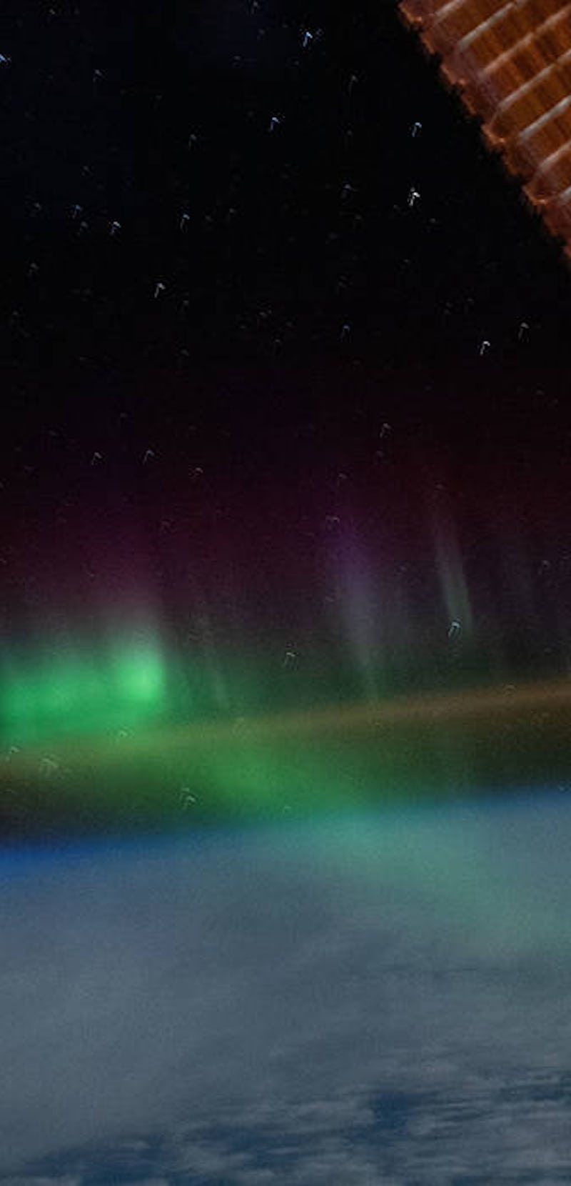 aurora australis gleaming above the Indian Ocean, halfway between Australia and Antarctica
