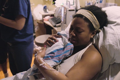 Lenox Hill's Dr. Amanda Little-Richardson holds her newborn daughter in Episode 8, via Netflix press...