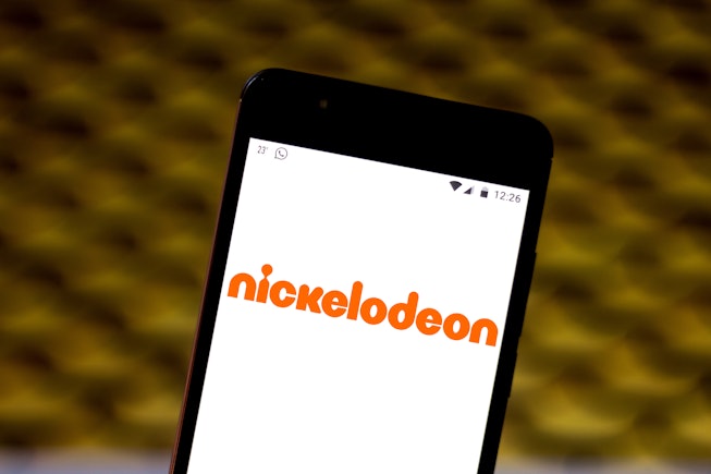 In this photo illustration the Nickelodeon logo is seen displayed on a smartphone.