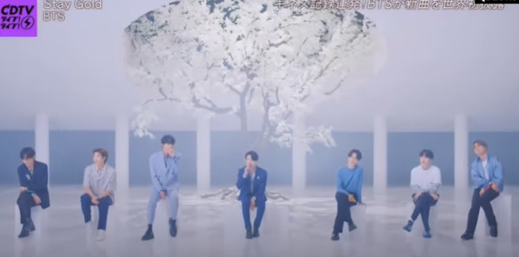 A screenshot from the video of BTS performing "Stay Gold" for the first time.