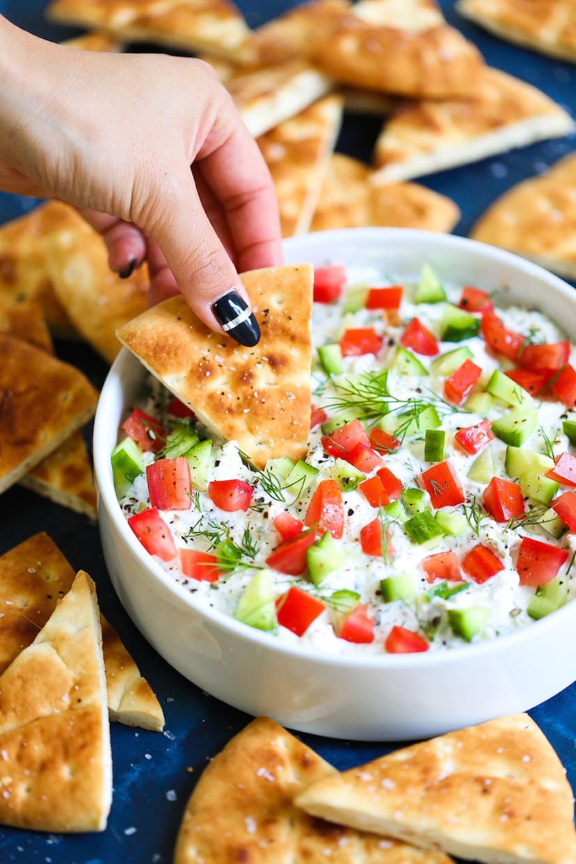 Creamy Greek Feta Dip from Damn Delicious is a zesty summer dip recipe to try.