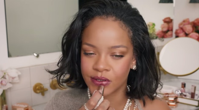 Rihanna applying lipstick in Fenty Beauty tutorial