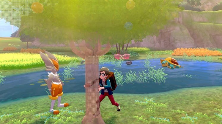 A player using the tree shaking option in Pokemone: Isle of Armor
