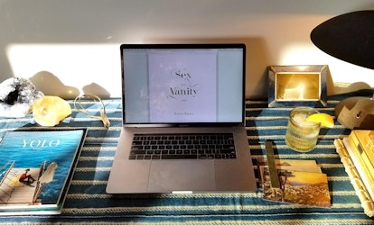 Cover of "Sex and Vanity" on a laptop in PDF version