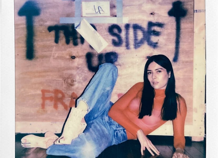 Patti Harrison posing