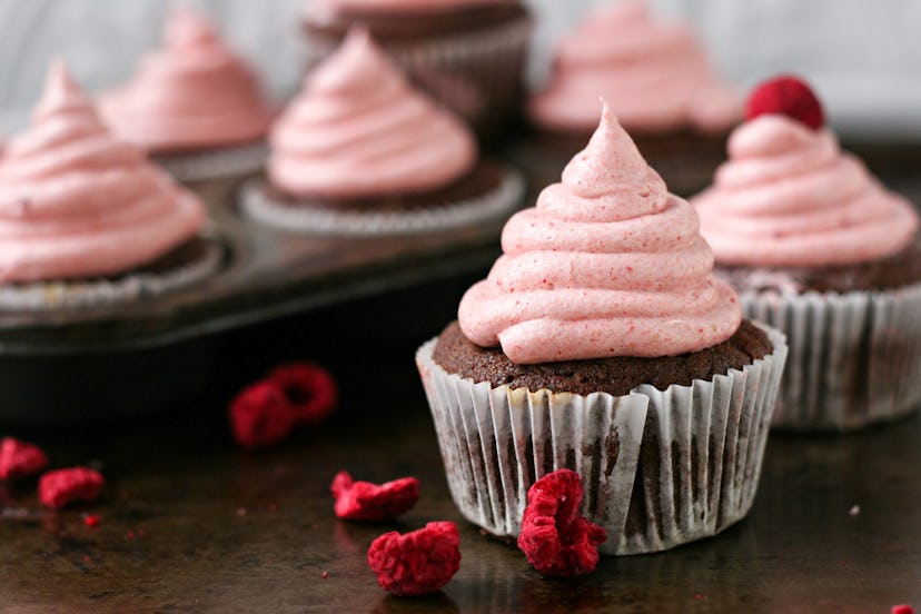 Dark chocolate cupcakes with fluffy strawberry frosting.