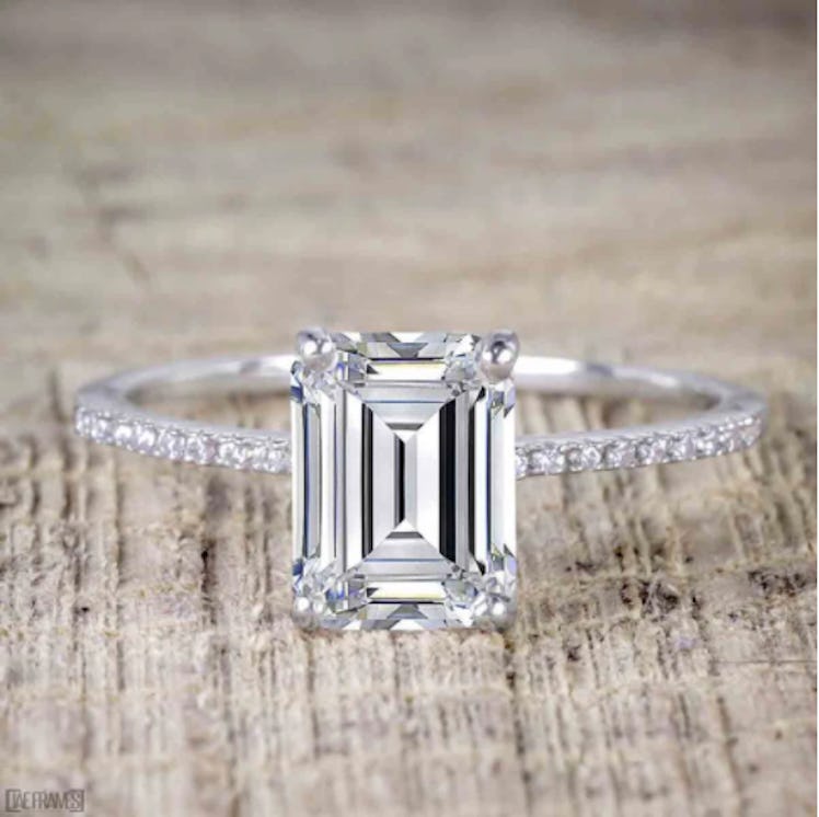 1.25 Carat emerald cut Moissanite and Diamond Solitaire Engagement Ring in 10k White Gold