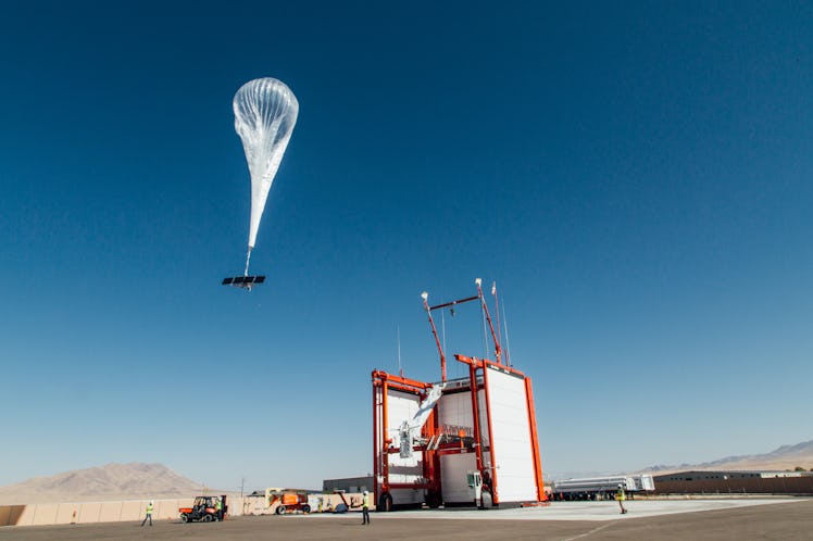 A Loon balloon taking flight.