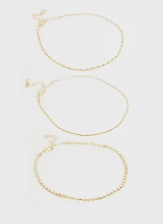 Curve pack of 3 anklets with dot dash and disc in gold tone