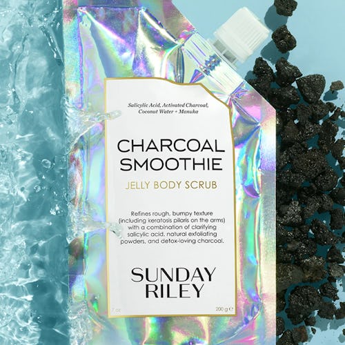 Sunday Riley's new Charcoal Smoothie Jelly Body Scrub in bag.