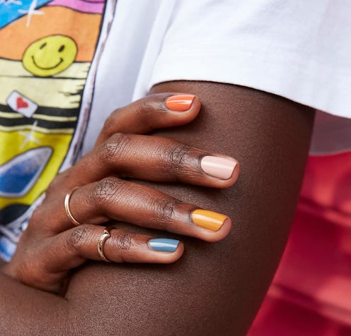 Pale purples, citrusy yellows, aquatic blues, and mellow pastels make up summer 2020's nail polish c...