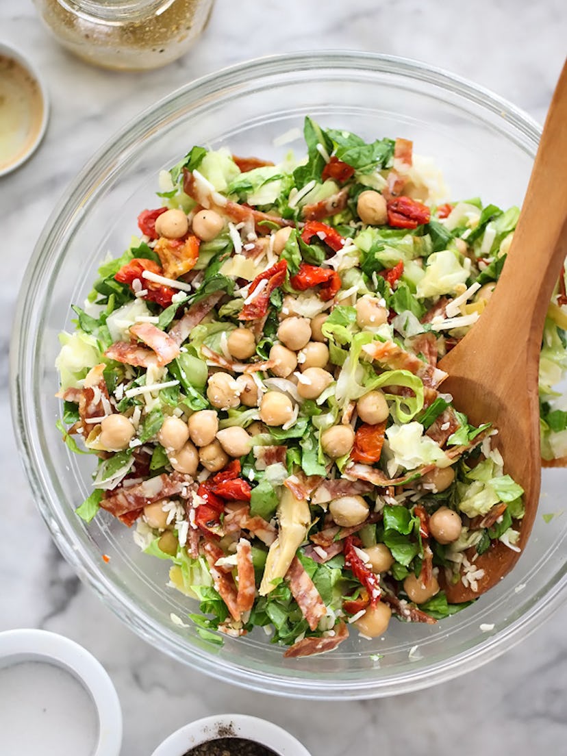 An Italian chopped salad with marinated chickpeas is the perfect summer dinner to have on the go. 
