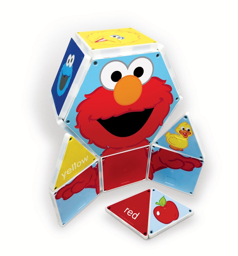 A set of Magnatiles that comes together to form the body of Elmo holding a yellow rubber ducky.