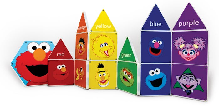 A bunch of Magnatiles featuring Elmo, the Count, Bert, Oscar, Ernie, Abby, Grover, and Cookie Monste...