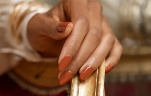 Ulta's Muse of Milan collection painted on model's nails.