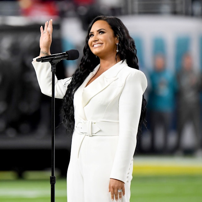 Demi Lovato performs the National Anthem onstage during Super Bowl LIV at Hard Rock Stadium on Febru...