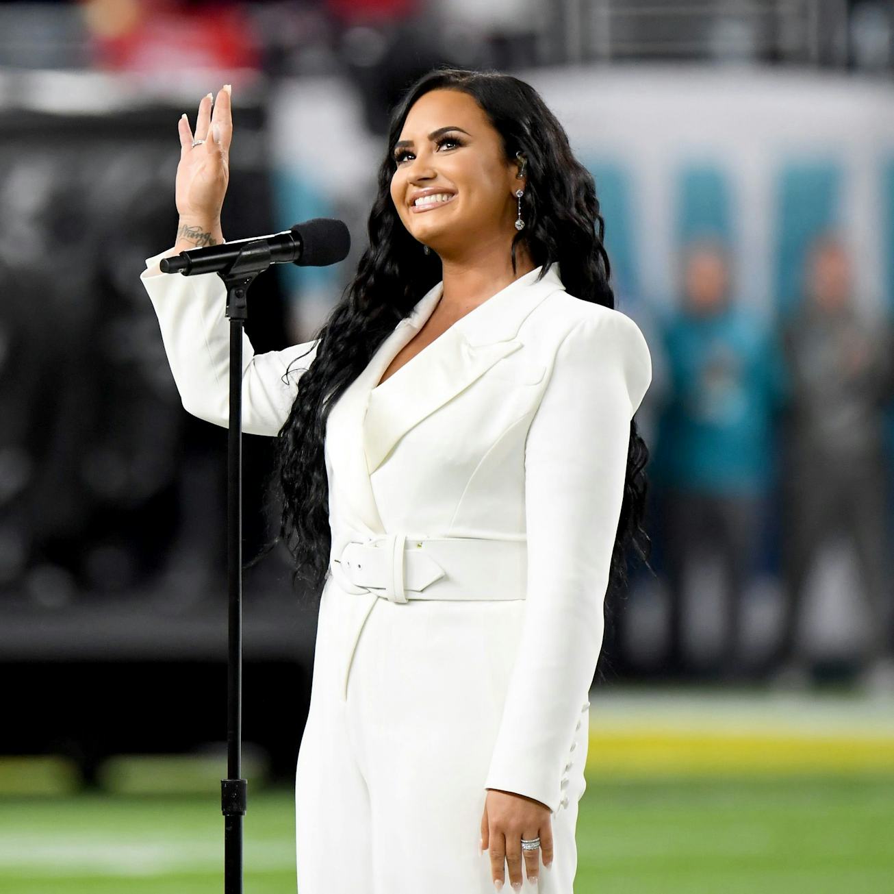 Demi Lovato performs the National Anthem onstage during Super Bowl LIV at Hard Rock Stadium on Febru...
