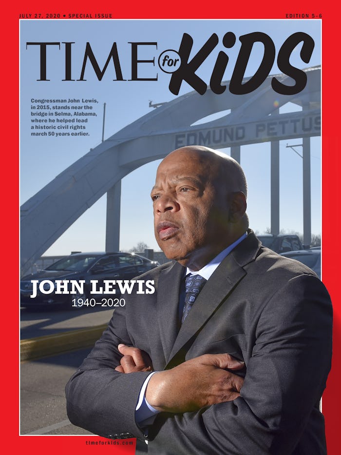 A picture of the great Congressman John Lewis standing resolutely in a black suit, white shirt, and ...