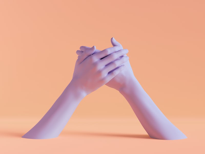 Sculpture of two white hands holding each other