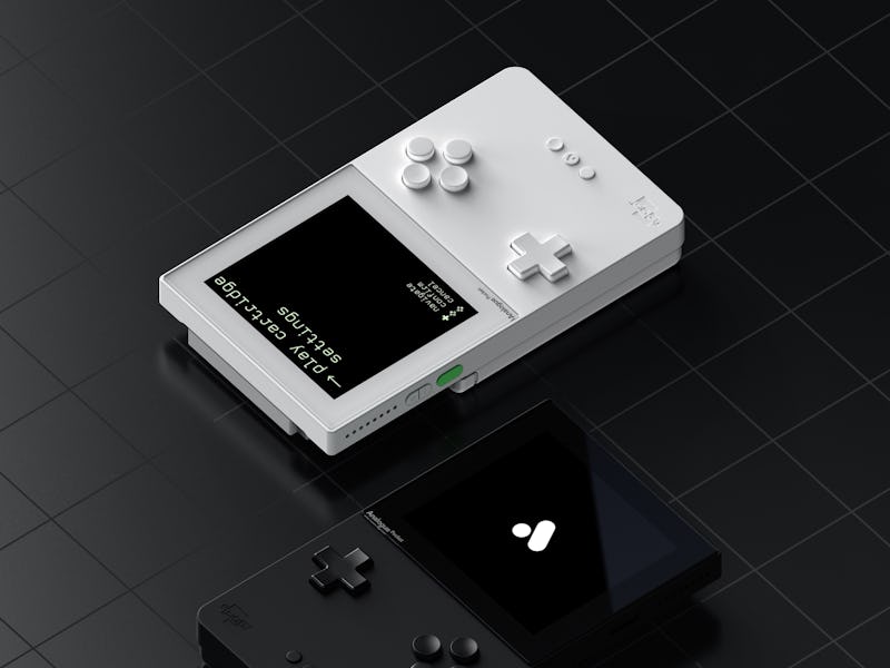 A black Pocket console and a white Pocket console sit side-by-side.