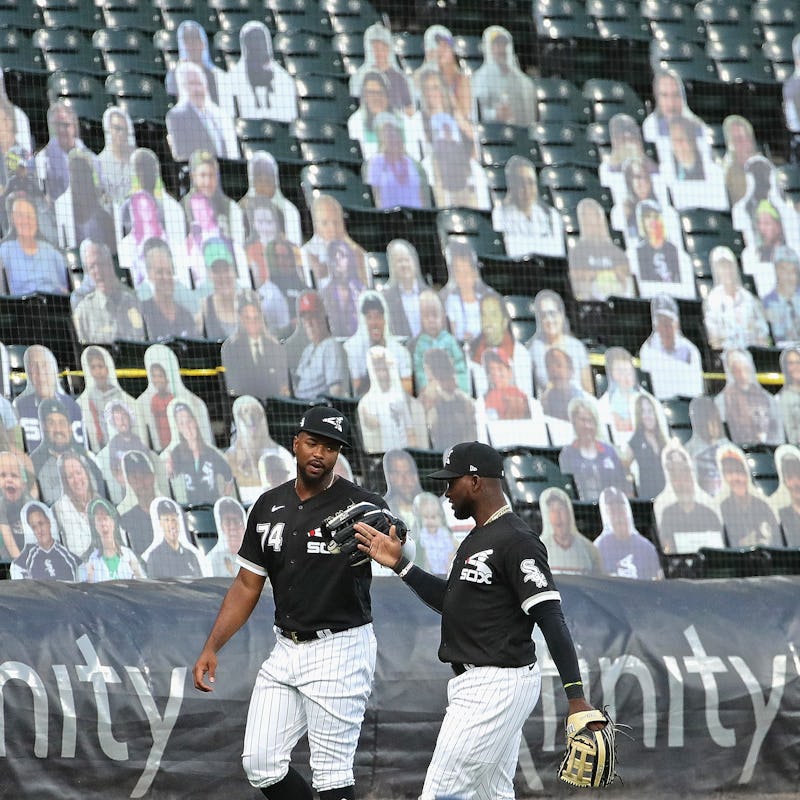 Pictures of fans on a stand during a baseball match during Covid-19