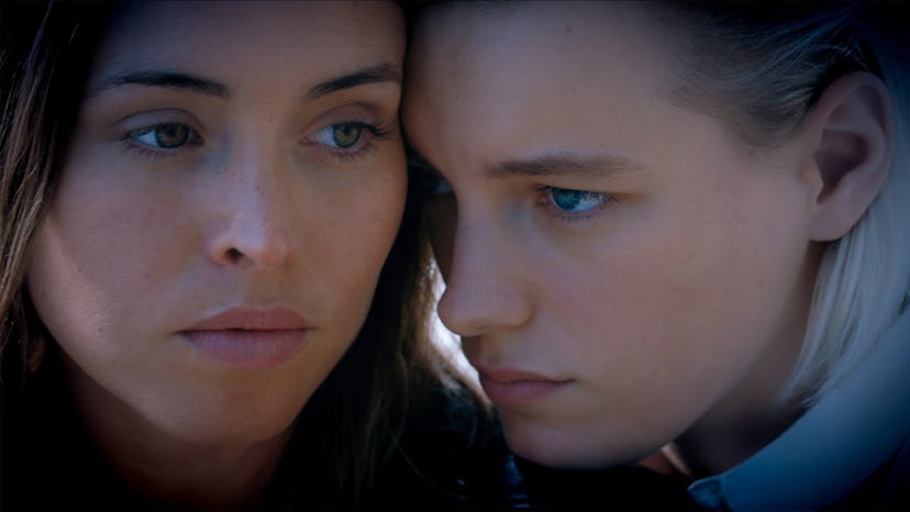 Erika Linder and Natalie Krill pose faces together in a still from Below Her Mouth
