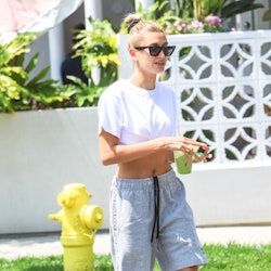 Hailey Bieber wearing athletic shorts.
