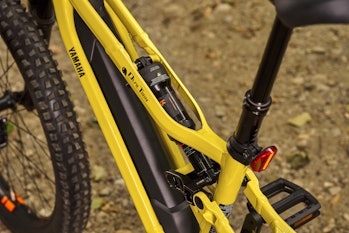 A close-up shot of an electric bike's rear shock.