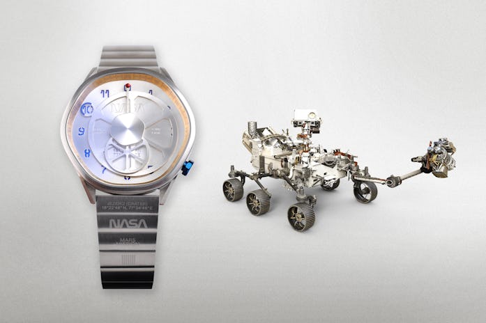 A watch next to the Mars Rover.