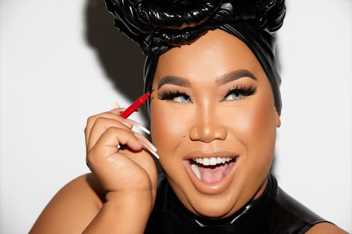 Patrick Starrr applying eyeliner from ONE/SIZE’s new Visionary Collection.