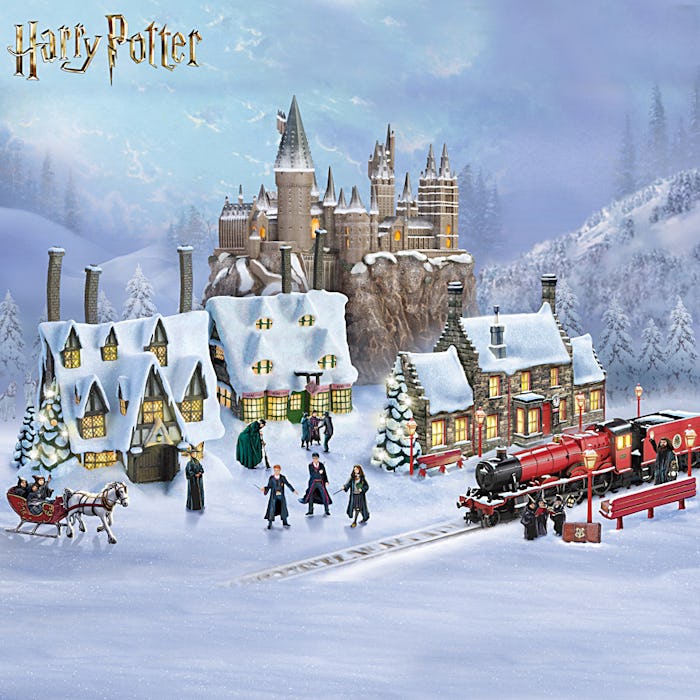 A depiction of an illuminated Hogwarts village complete with castle, characters, and Hogwart's Expre...
