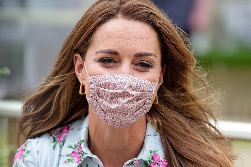 Kate Middleton poses in a face mask