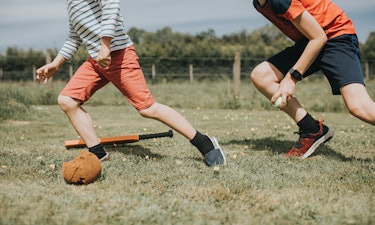 Two boys playing baseball