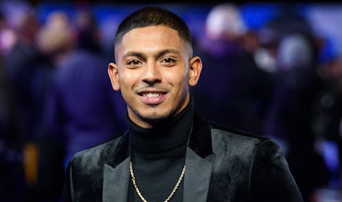 A picture of Sean Sagar wearing a black suit