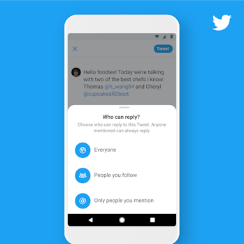 Twitter's new conversation dynamics feature show on a smartphone screen