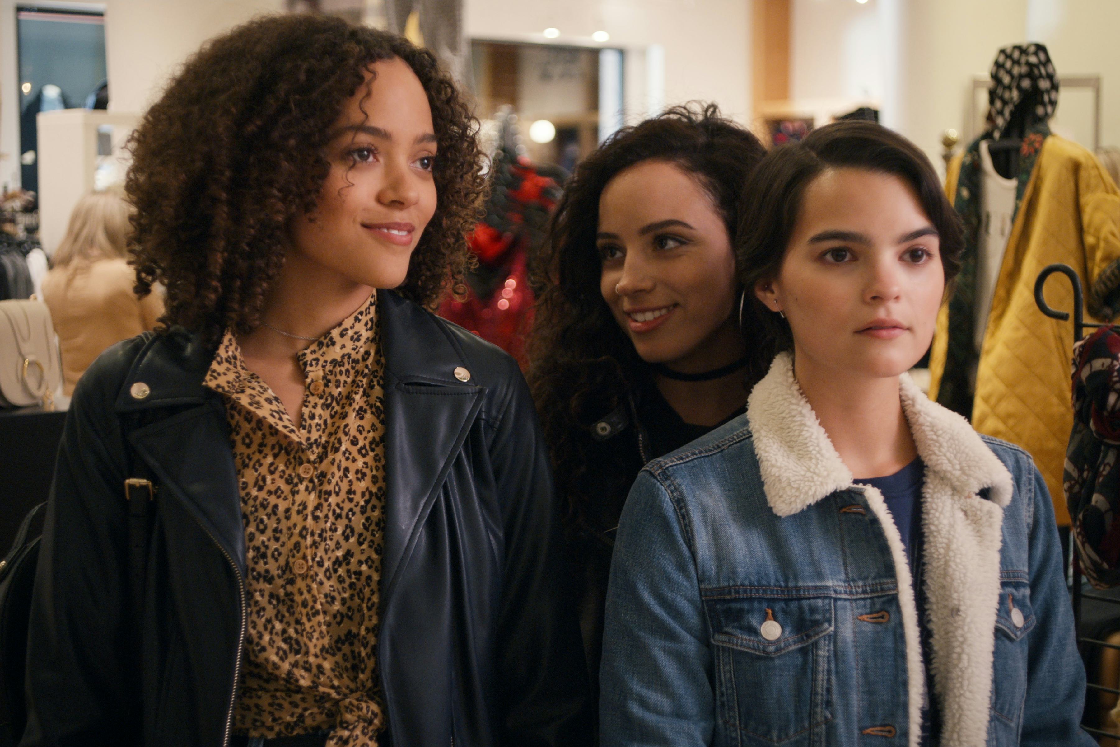 TRINKETS (L to R) QUINTESSA SWINDELL as TABITHA, KIANA MADEIRA as MOE TRUAX, and BRIANNA HILDEBRAND ...