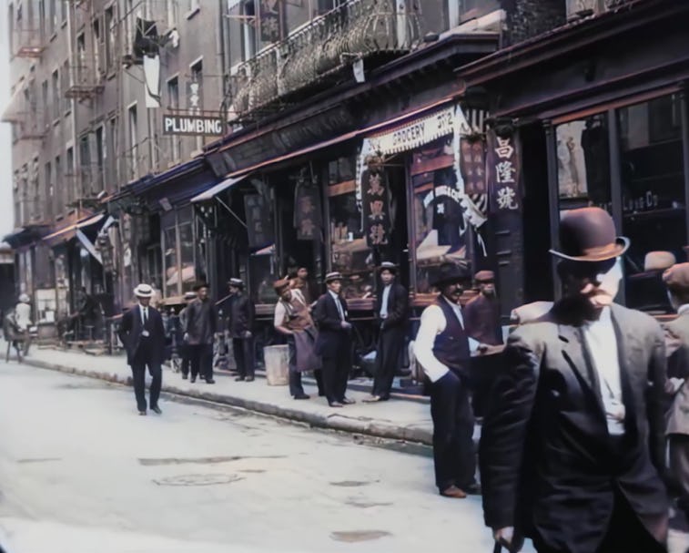 AI-restored footage can be seen of an old clip from New York City in 1911. A man with a mustache is ...