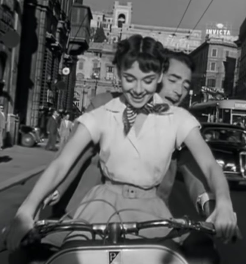 What's more adorable than riding on a Vespa with your partner?