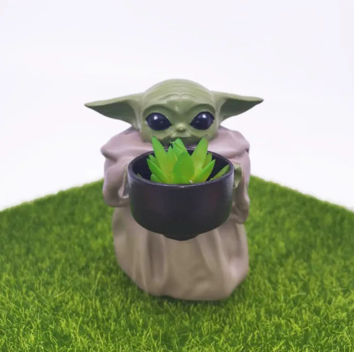 This mini Baby Yoda pot planter will take your fandom to the next level.