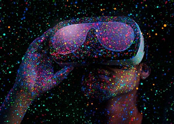 A man using a virtual reality headset. 