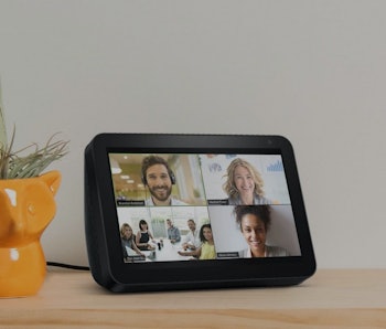 Four people video-conference on an Amazon Echo Show device.