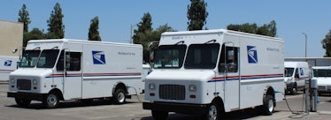 The Postal Service is experimenting with electric delivery vans, like these from Motiv Power Systems...