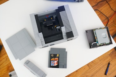 Remove the top cover from the Lego NES.